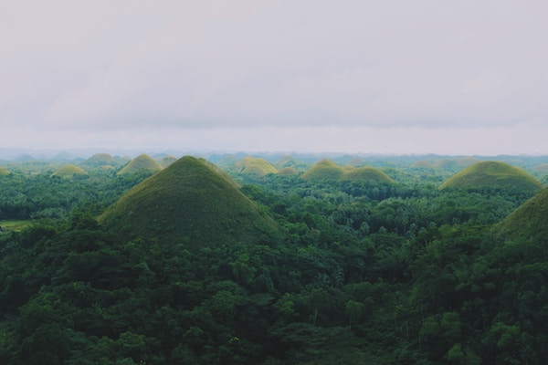 The Chocolate Hills are one of many places to visit in the Philippines